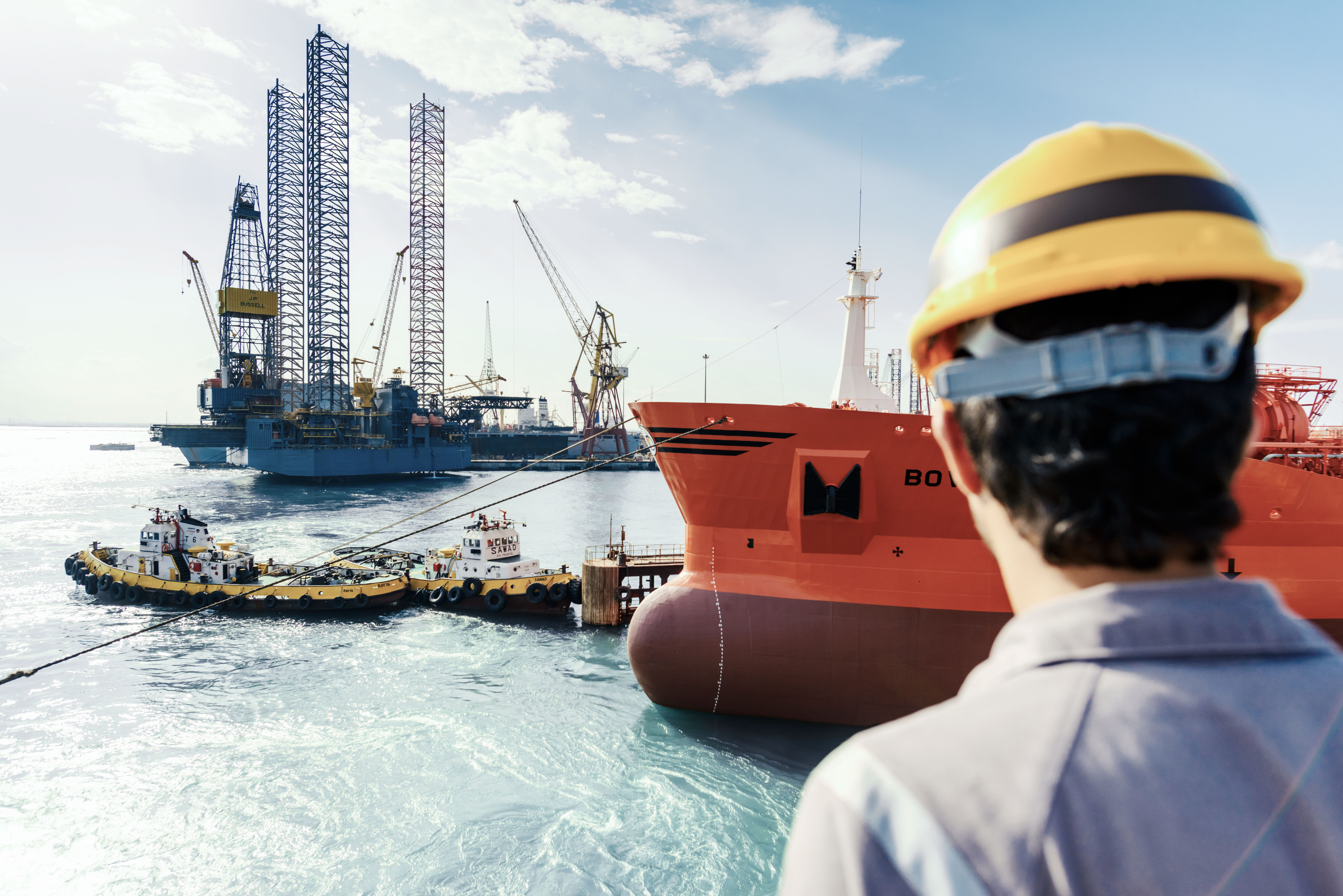 Odfjell crew observing the Bow Cardinal chemical tanker during port operations.