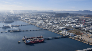 Aerial view of Odfjell Terminals Korea showing storage tanks, docked chemical tankers, and surrounding industrial complex.